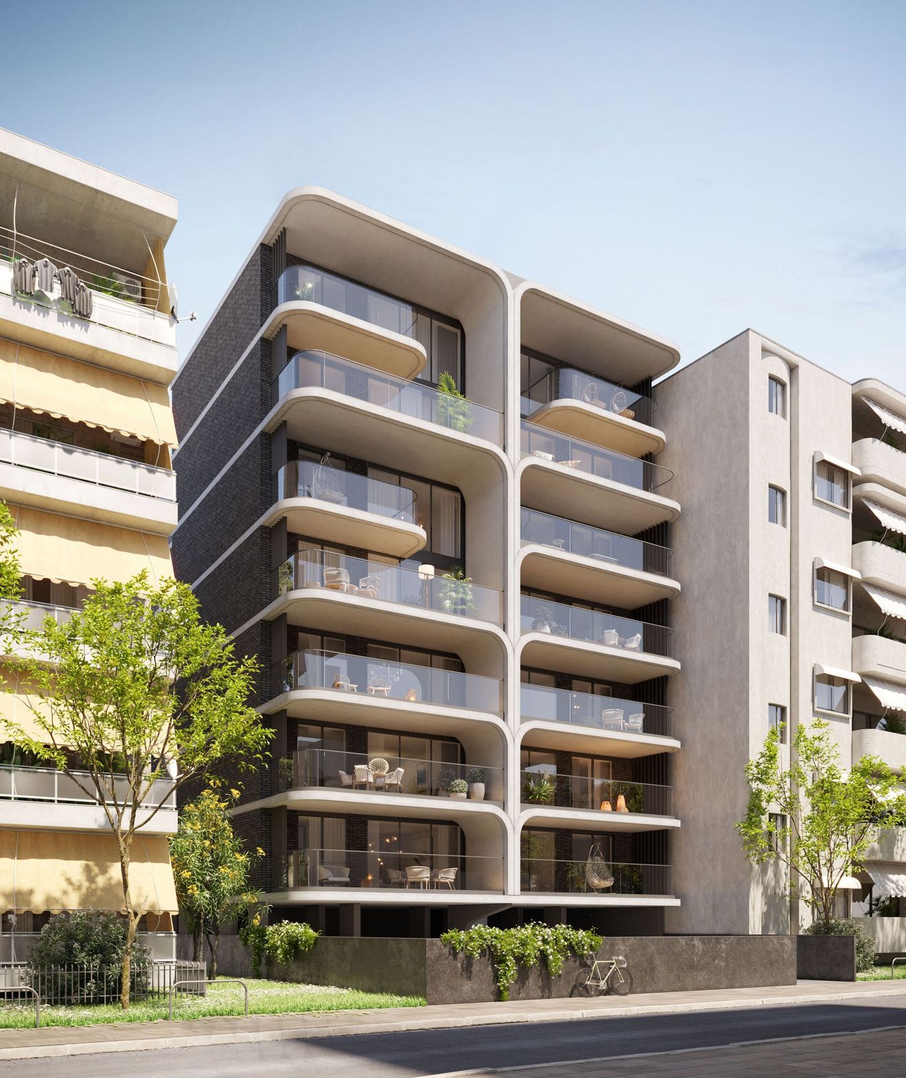 Modern multi-story apartment building with balconies and unique architectural design on a clear day.