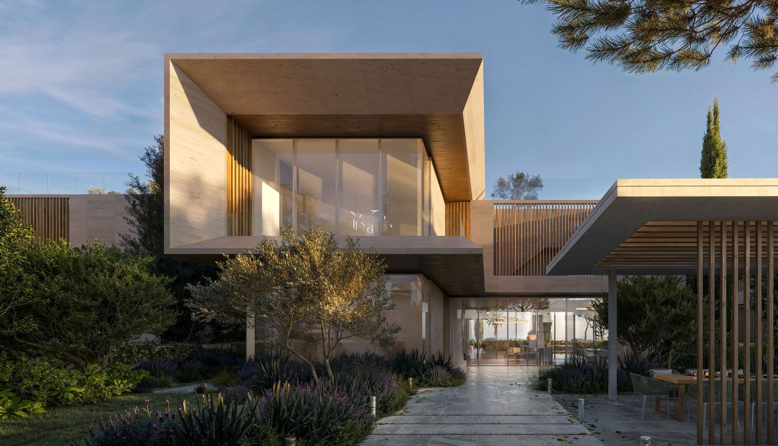 Modern luxurious house with large windows and lush landscaping under a clear sky.