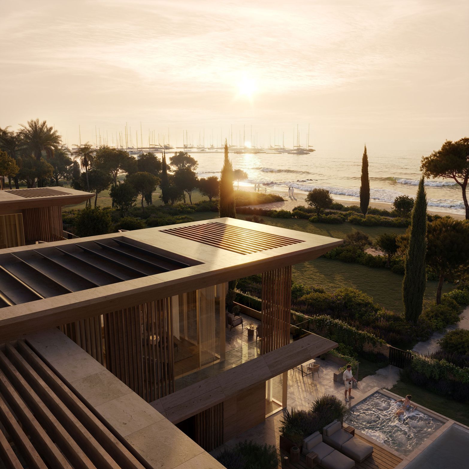 Modern building with skylights overlooking a serene sunset coastline and lush gardens.