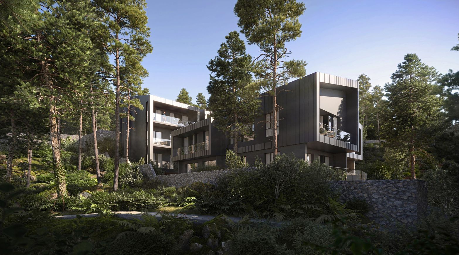 Modern dark-toned architectural complex with angular design nestled within a dense forest.