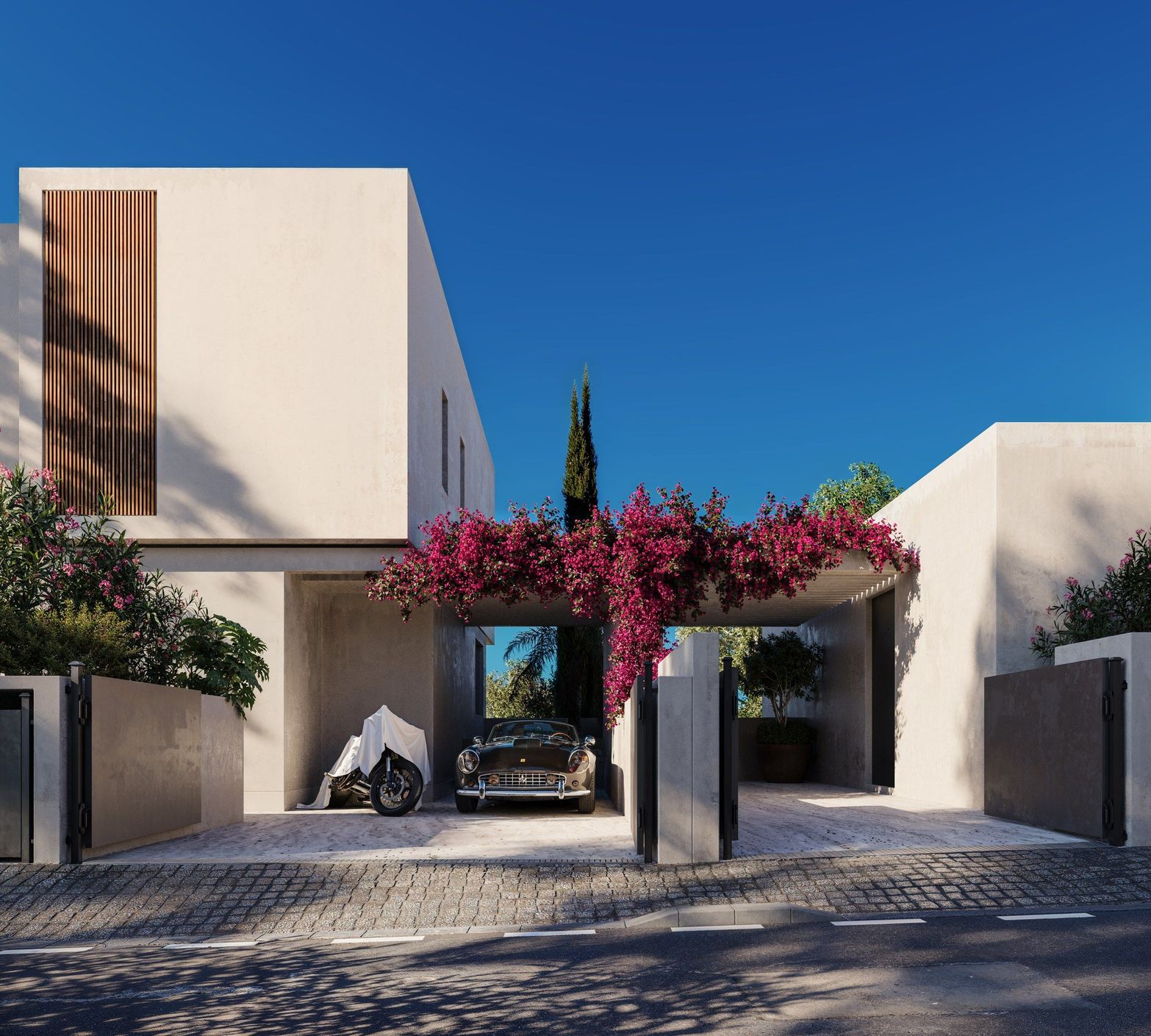 Modern white villa with a classic car parked under vibrant pink bougainvillea blossoms.