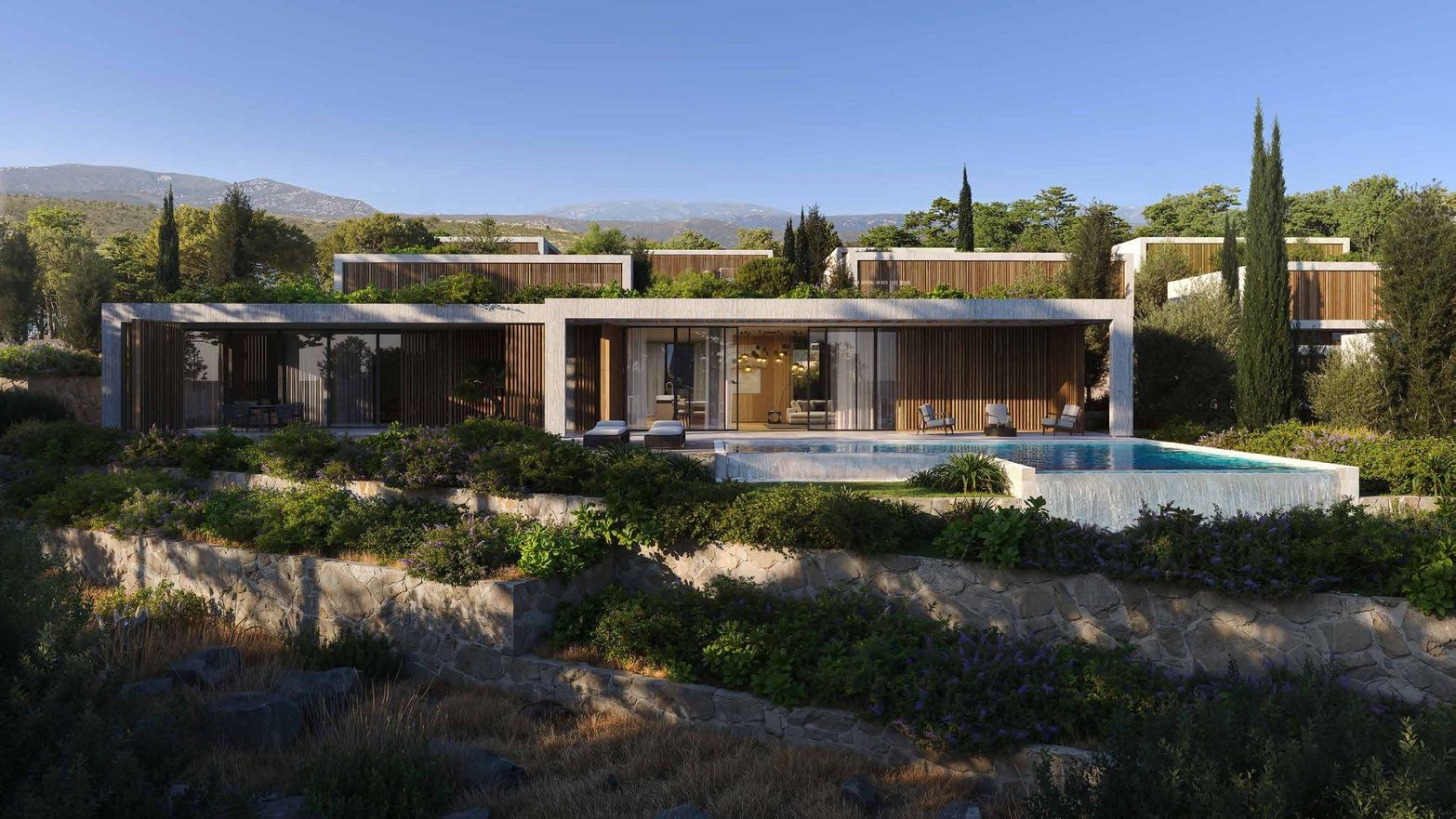 Sleek modern villa with a swimming pool set within a lush, sunlit Mediterranean landscape.